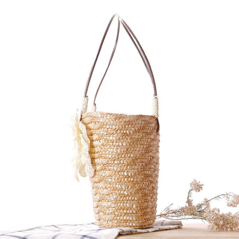 Beach bag with decorative flower detail embellishment Bowlift