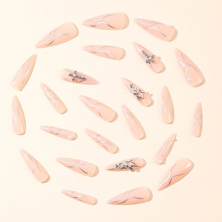 Stiletto Acrylic Nail Art Extensions with Decorative Accents Bowlift