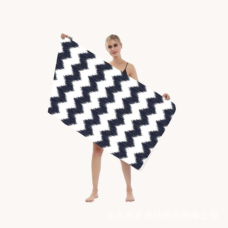 Beach towel with modern leaf and geometric design Bowlift