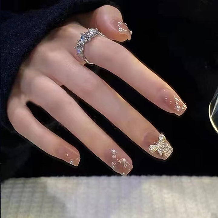 Glamorous glitter artificial nails with butterfly element Bowlift