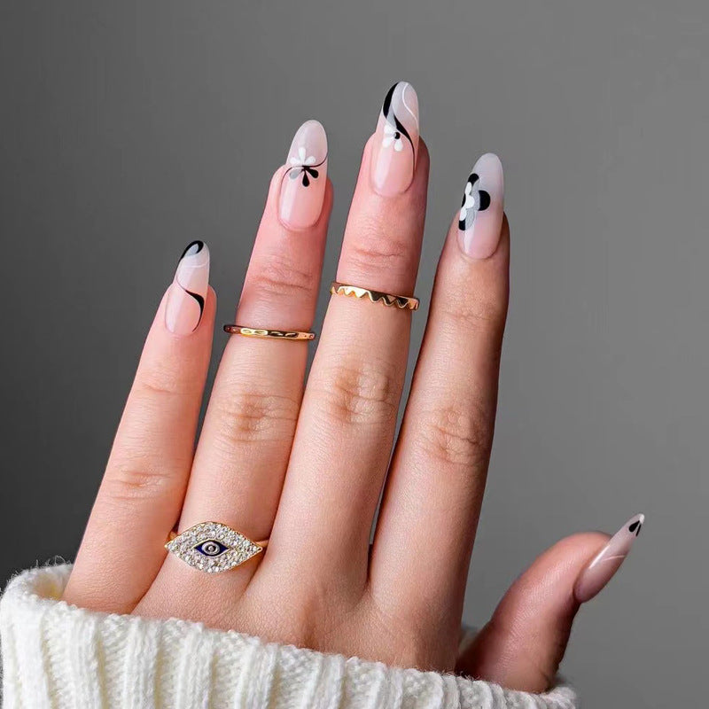 Artful nail extensions with an elegant leaf pattern Bowlift