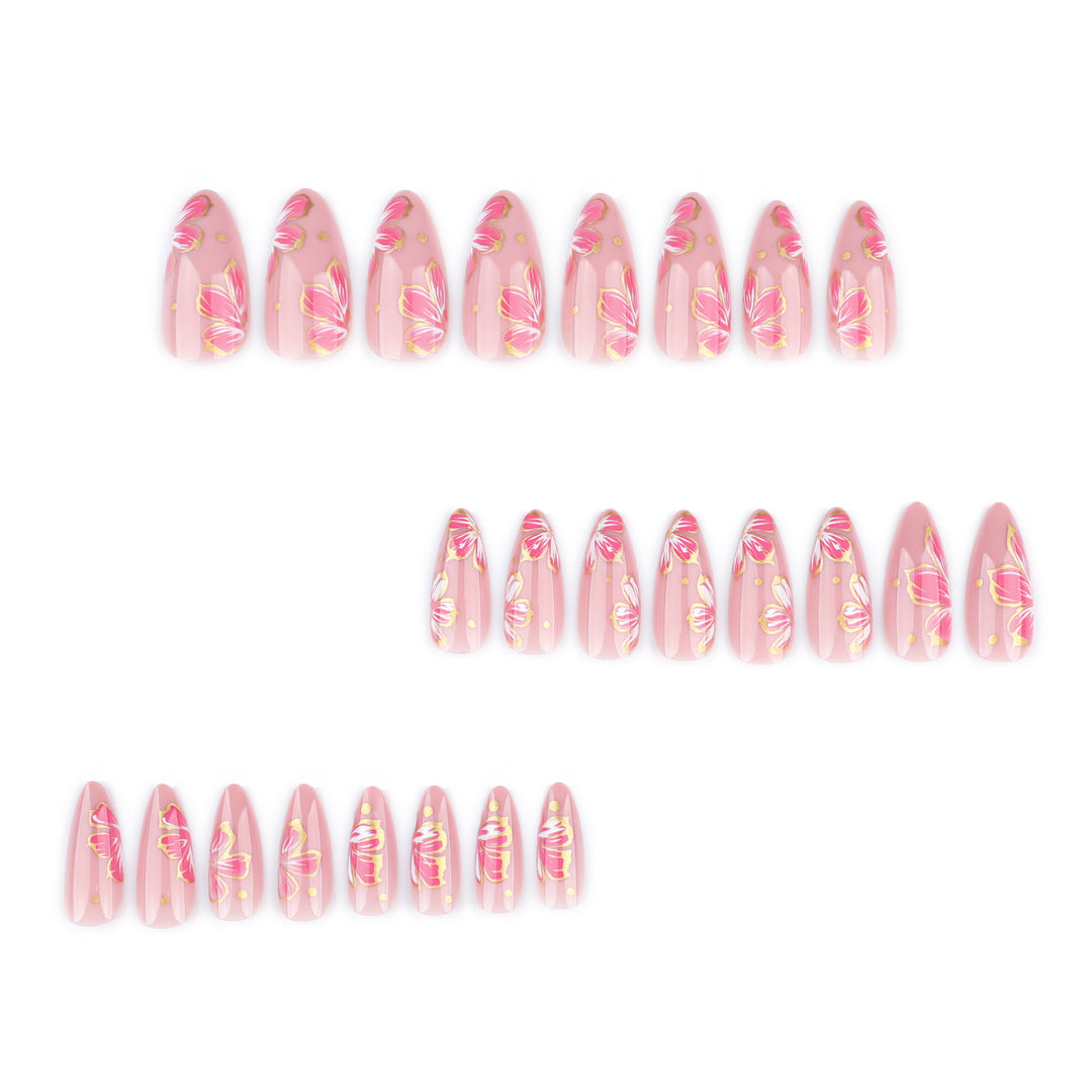 Artful nail art with elegant floral designs and gold accents Bowlift