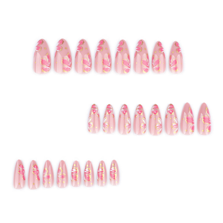 Artful nail art with elegant floral designs and gold accents Bowlift