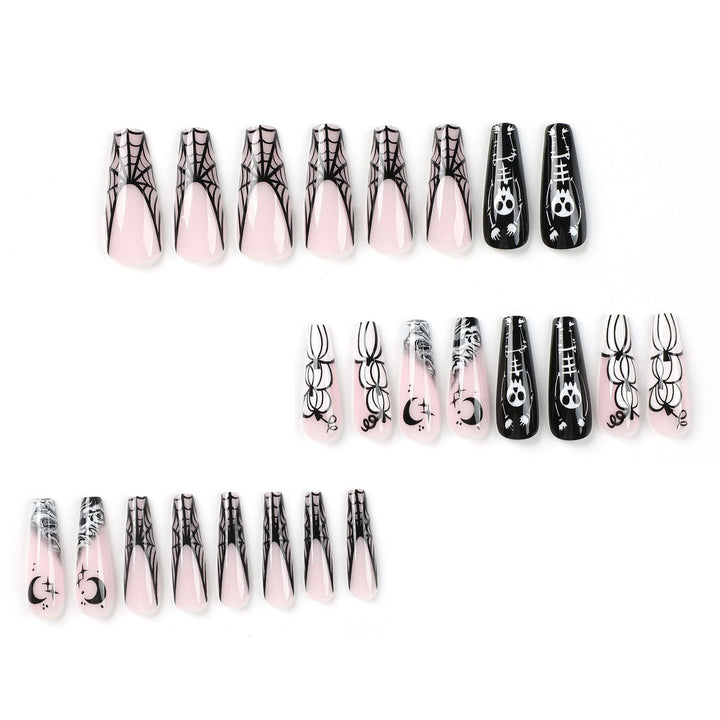 Artificial nail art in Halloween style with graffiti designs Bowlift