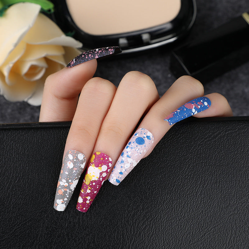 Artistic splatter design artificial nails Bowlift