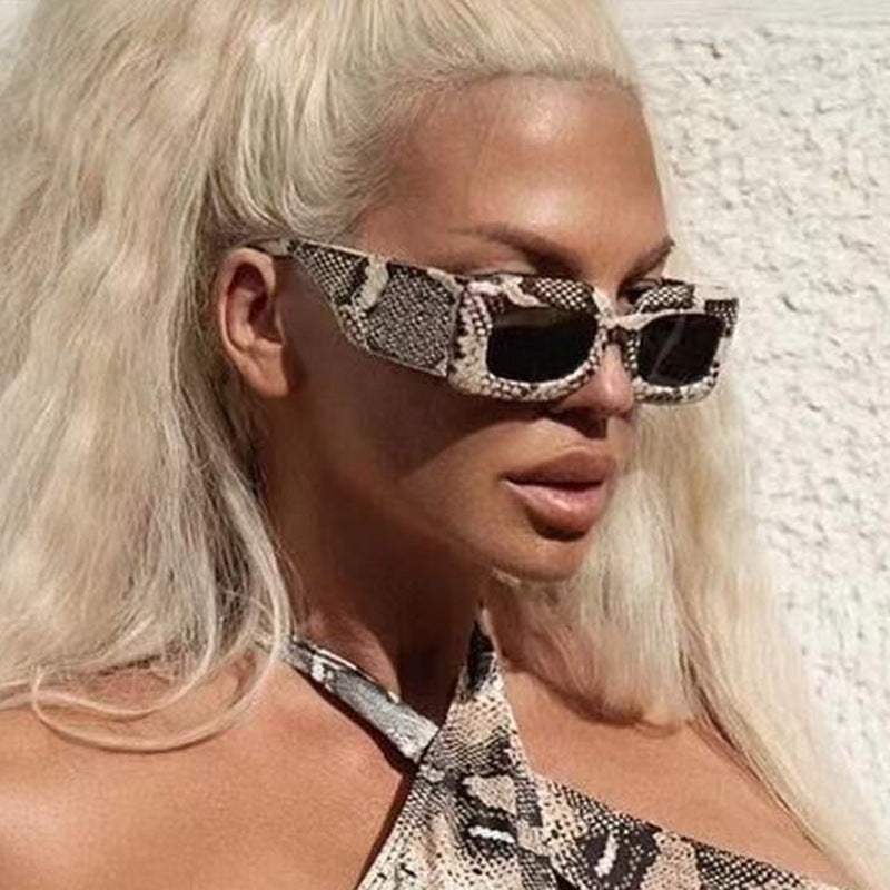 Women oversized sunglasses in fashionable snake leather look Bowlift
