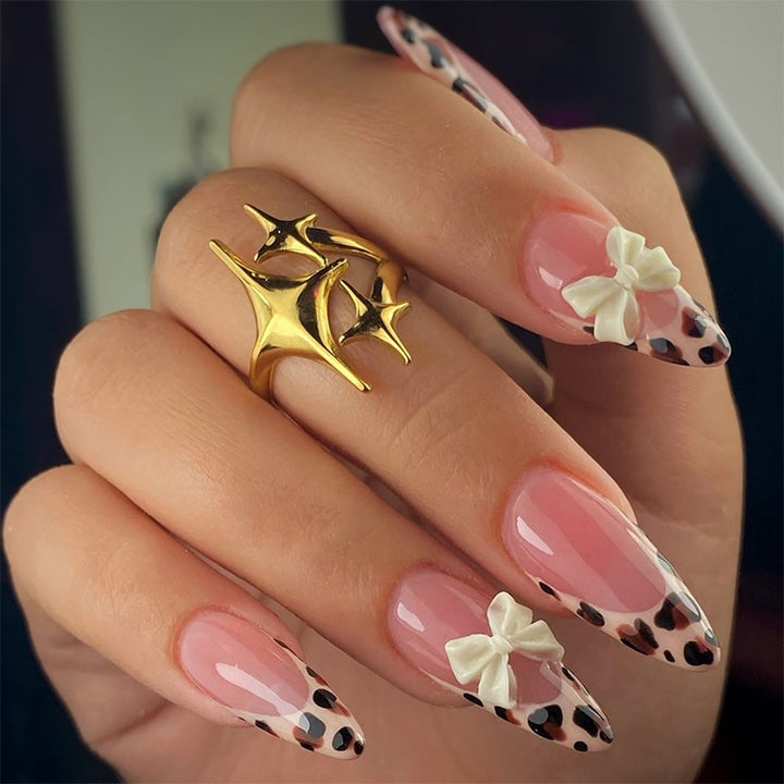 Nail art set with leopard pattern and glitter embellishments Bowlift