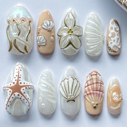 luxurious artificial nail set with maritime designs and golden accents Bowlift