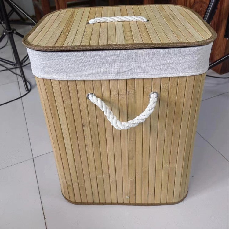 Laundry basket made of natural bamboo by Bowlift