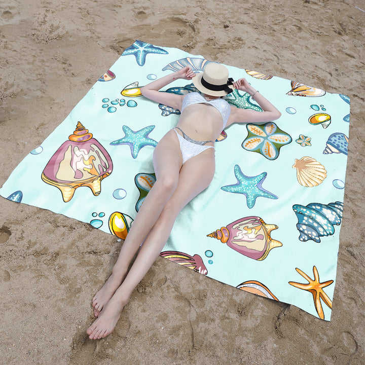 Beach blanket with colorful turtle pattern Bowlift