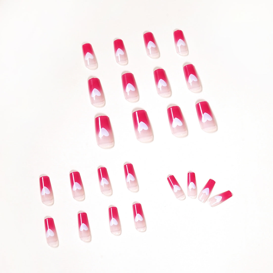 Artful nail extensions in romantic heart design Bowlift