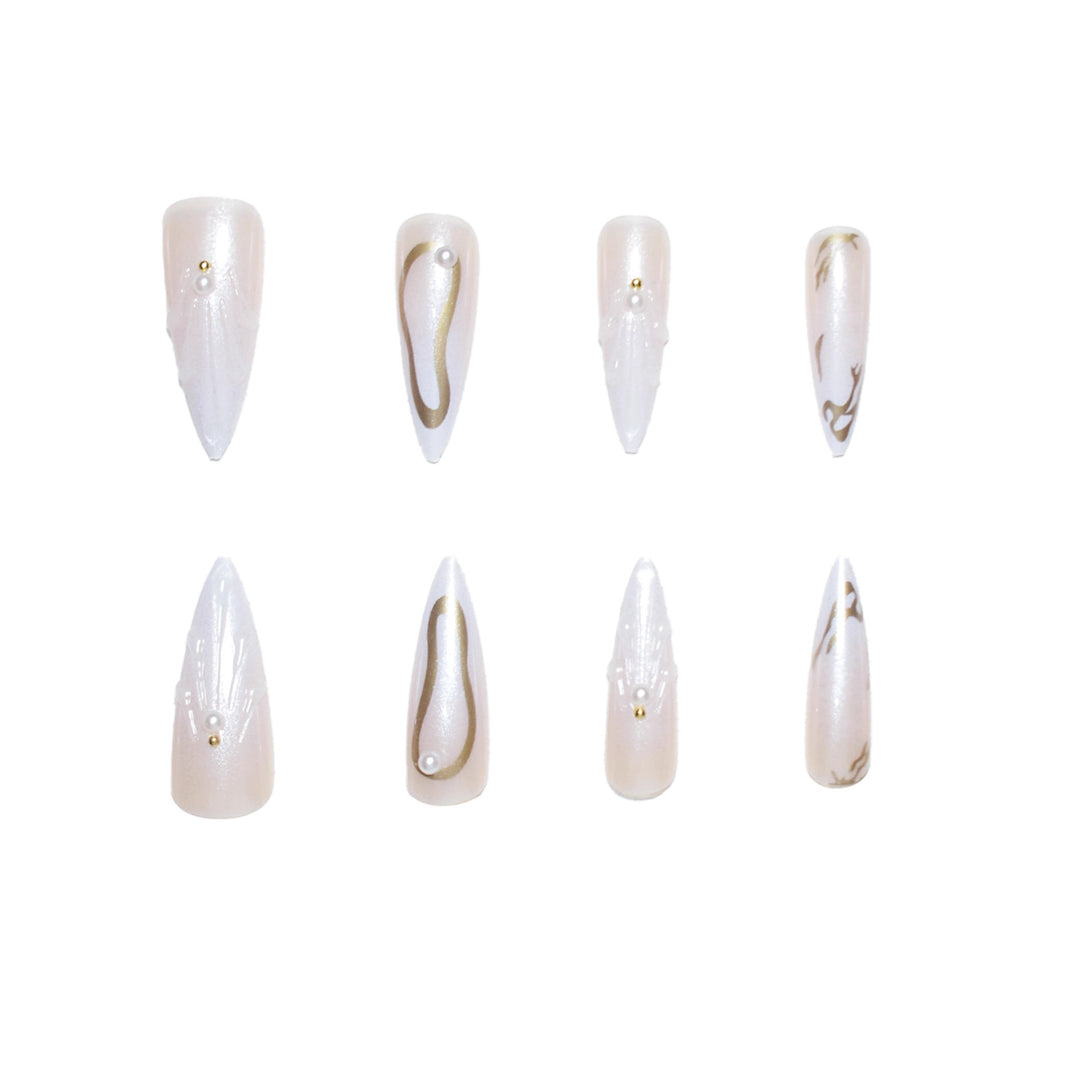 Artistic Press-On Nail Designs with Pearl Accents Bowlift