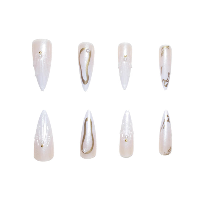Artistic Press-On Nail Designs with Pearl Accents Bowlift