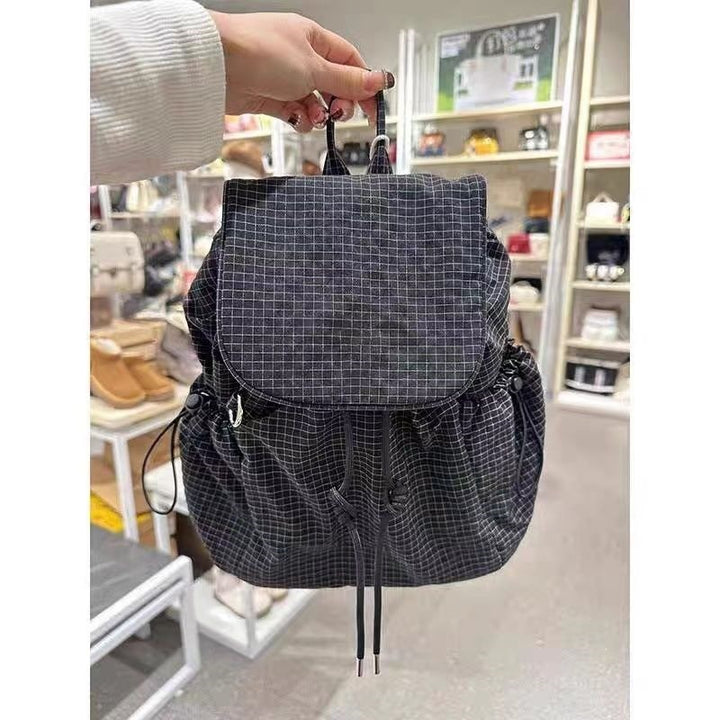 Fashionable Backpack with Practical Drawstring Bowlift