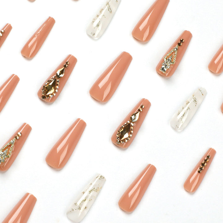 Artful nail extensions with glitter embellishments and delicate accents Bowlift