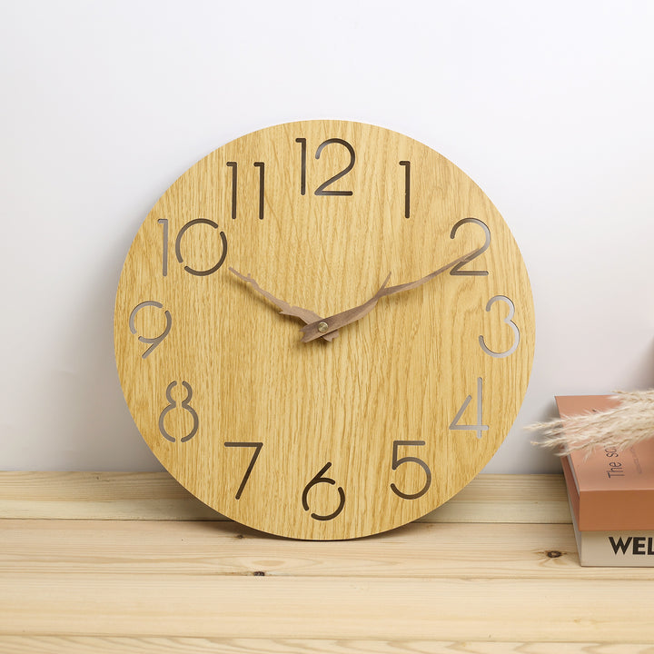 Wall clocks made from untreated wood Bowlift