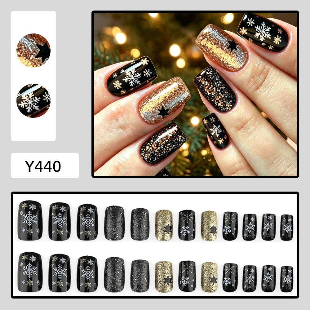 Creative artificial nails with sparkling glitter and festive winter design Bowlift
