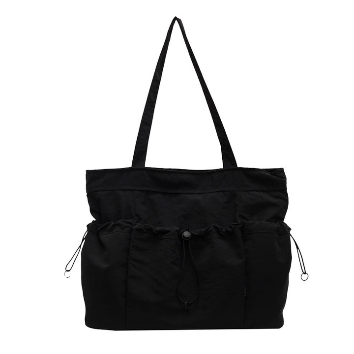 Practical everyday handbag with drawstring Bowlift
