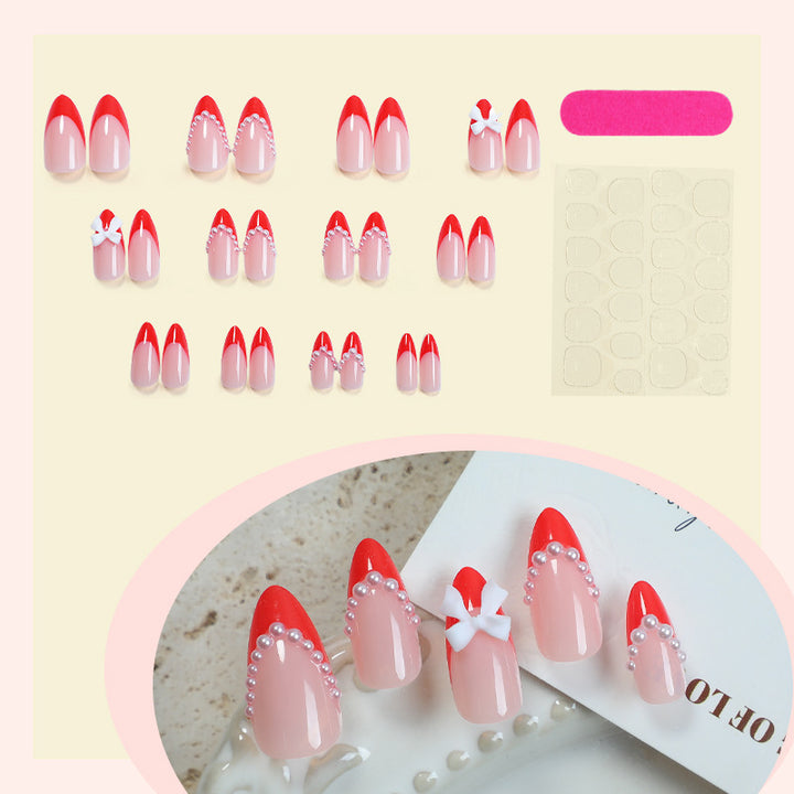 Elegant Press-On Nail Set with Pearl and Bow Accents Bowlift