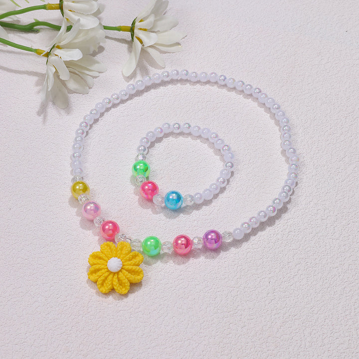 Playful jewelry set with flower pendant Bowlift