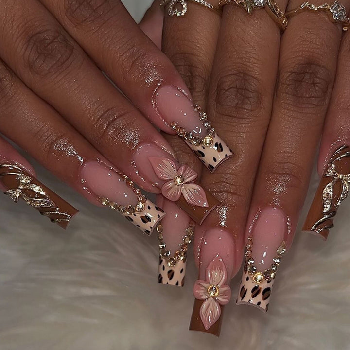 Artistic Long Press-On Nail Extensions with Elegant Floral Design Bowlift