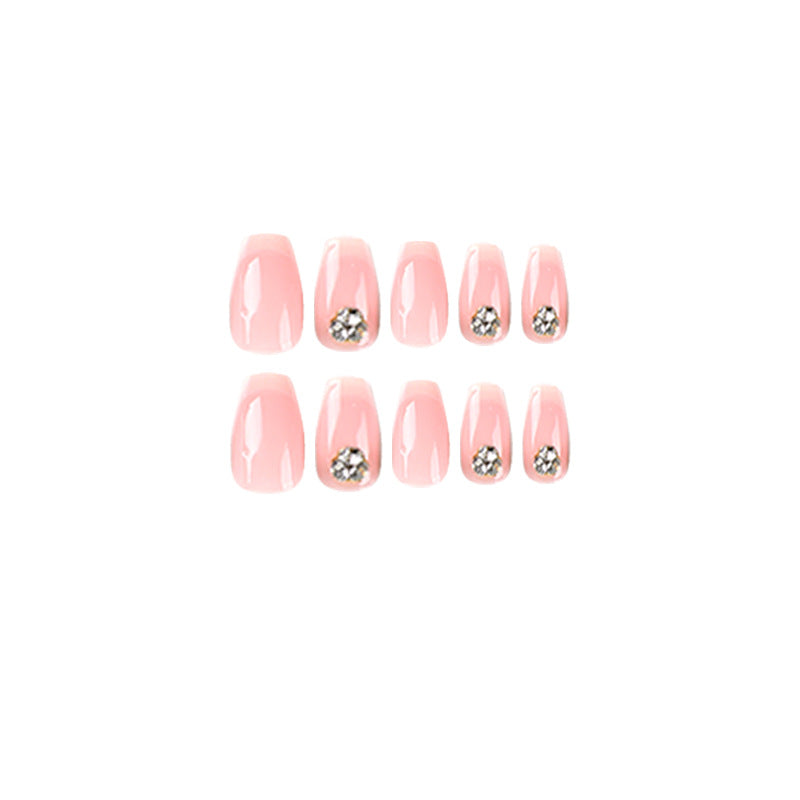 Artful nail extensions with elegant French tip and rhinestone embellishments Bowlift
