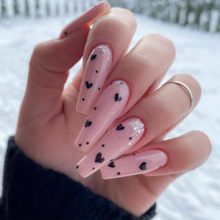 Artistic stiletto nails with heart design Bowlift