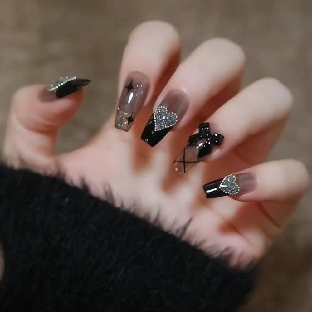 Glamorous artificial nails with heart and glitter details Bowlift