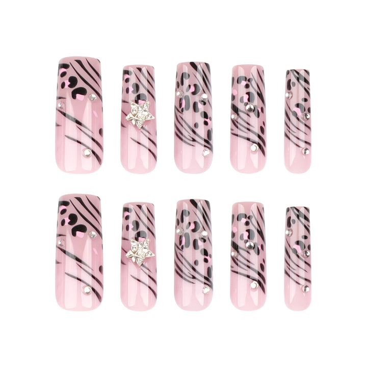 Artful Nail Art with Zebra Pattern and Glitter Accents Bowlift