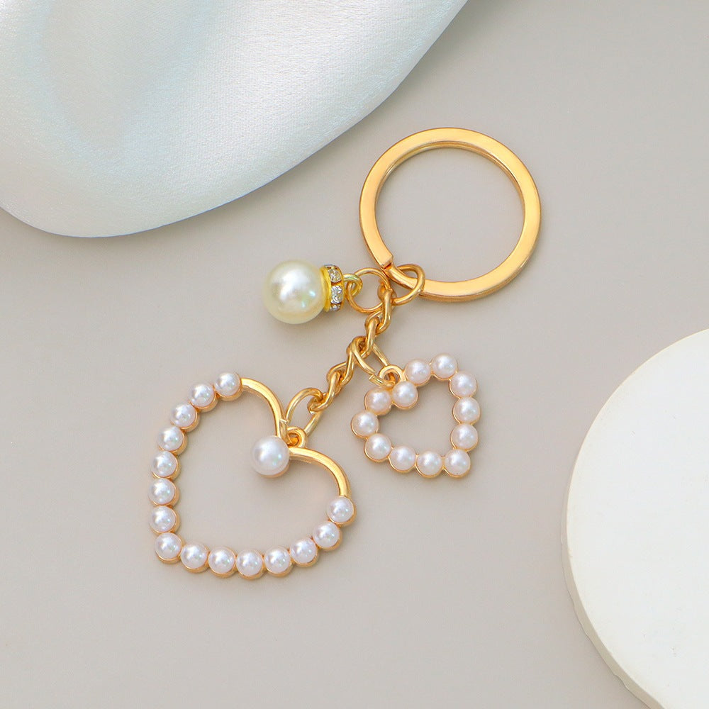 Keychain with heart and flower motif Bowlift