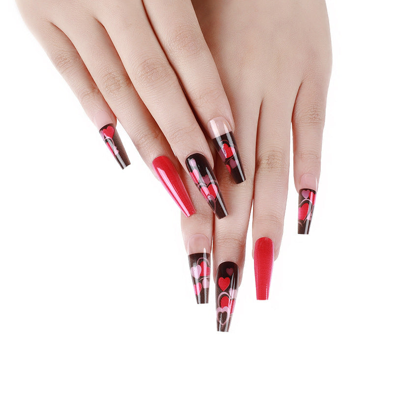 Fake nails in an eye-catching heart design Bowlift