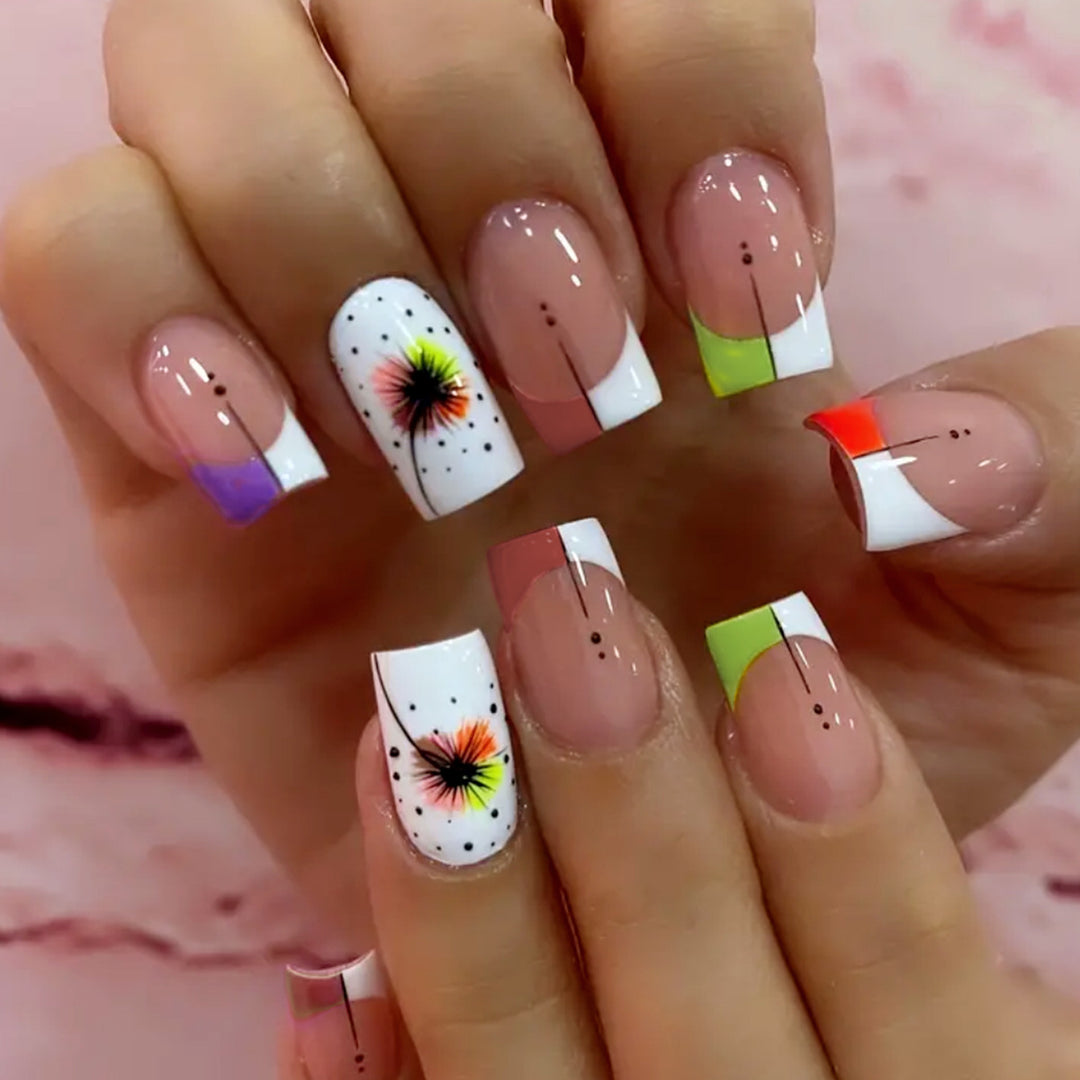 Artful nail art with gradient and floral accents Bowlift