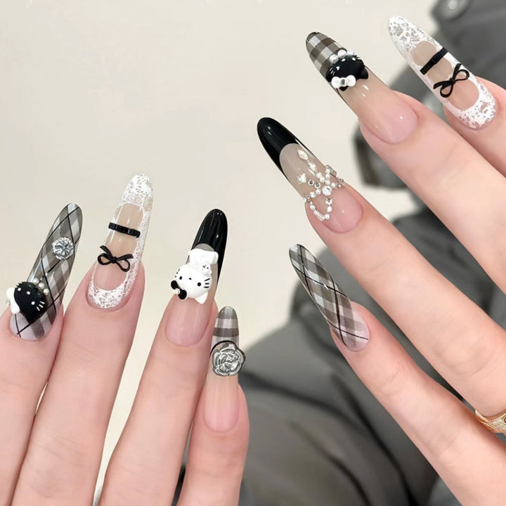 Decorative Press-On Nail Extensions with Bow and Rhinestone Accents Bowlift