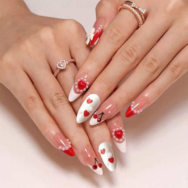 Creative nail art with heart and cherry motifs Bowlift