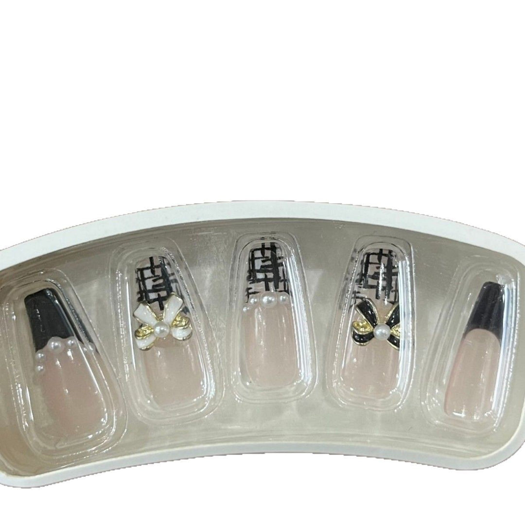 Glamorous nail designs with pearl and rhinestone accents Bowlift