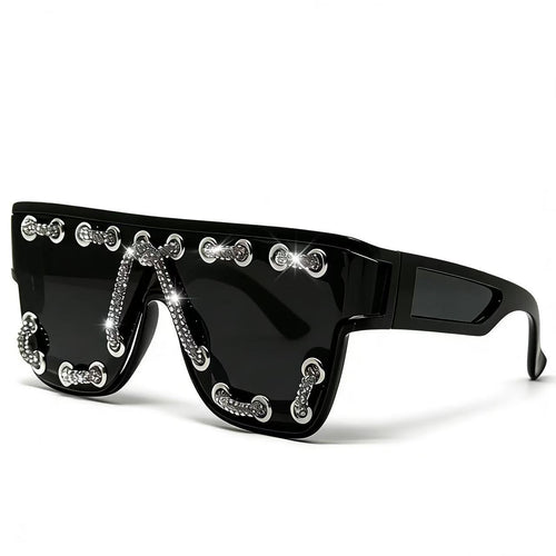 Ladies sunglasses with extravagant design and decorative chain embellishment Bowlift