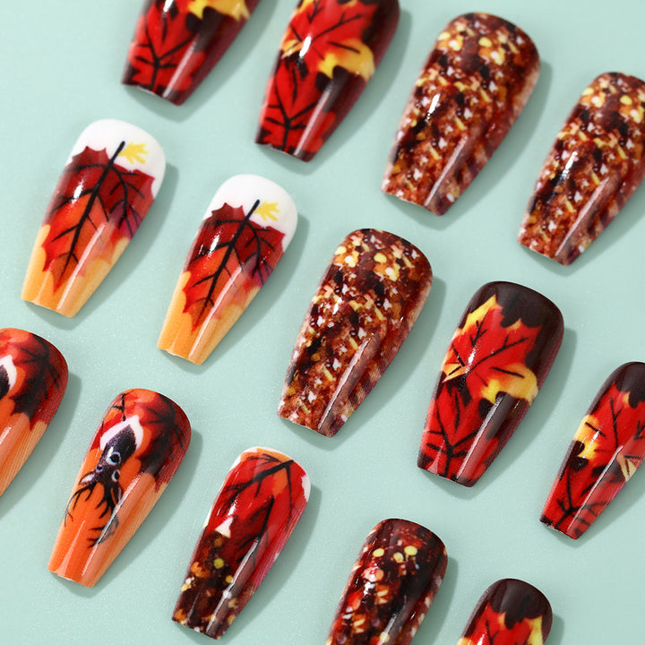 Artificial nails in autumn leaf design Bowlift