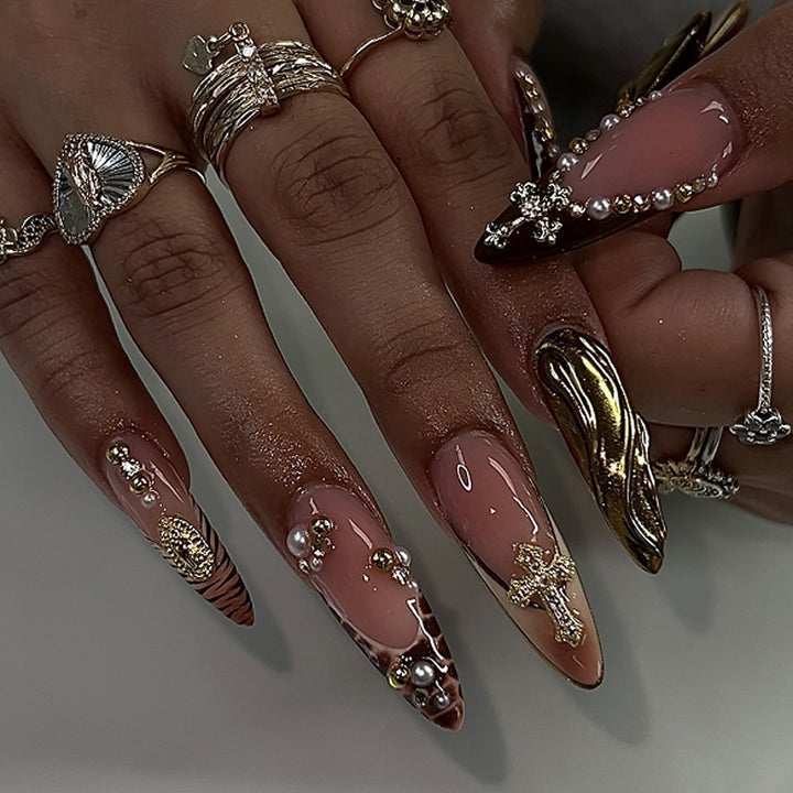Artful acrylic nails with glitter and rhinestone decorations Bowlift