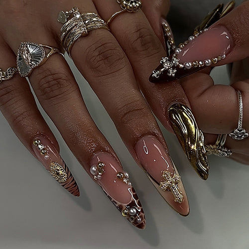 Artful acrylic nails with glitter and rhinestone decorations Bowlift