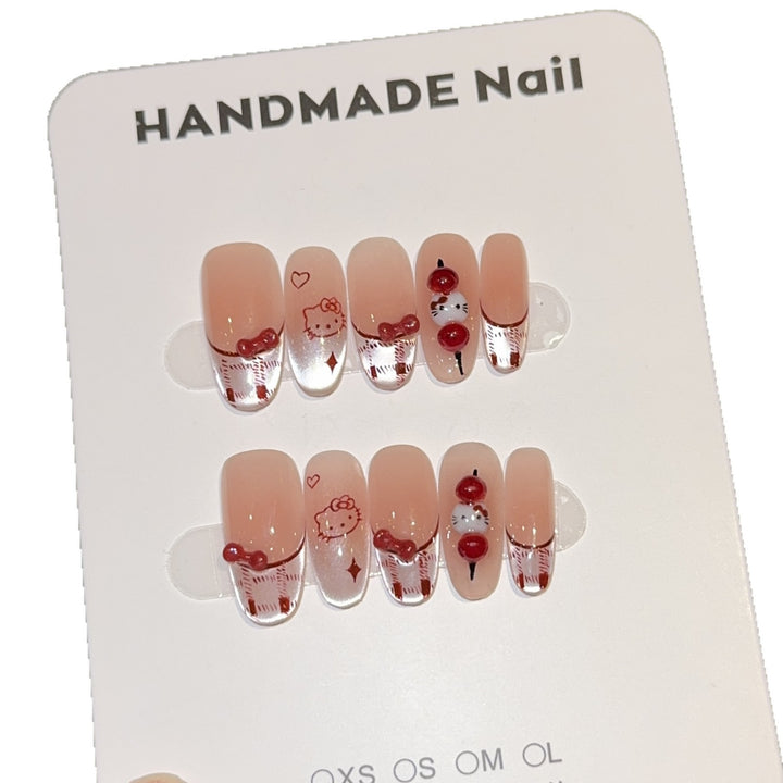 Artificial nails with playful Hello Kitty design Bowlift