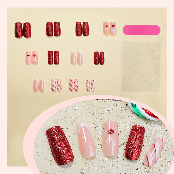 Artificial nail set with sparkling glitter and festive accents Bowlift
