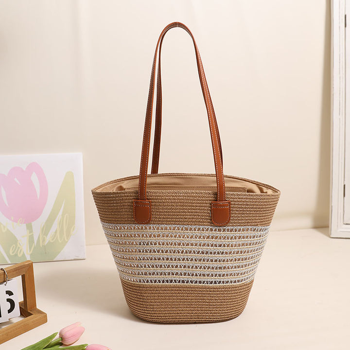 Elegant Bast bag with leather accents Bowlift
