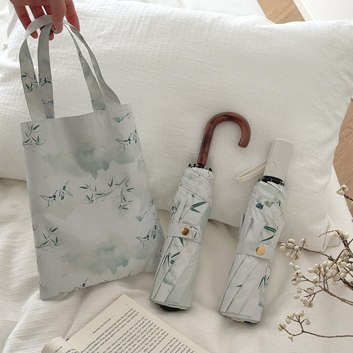Women's shopping bag with integrated foldable umbrella Bowlift