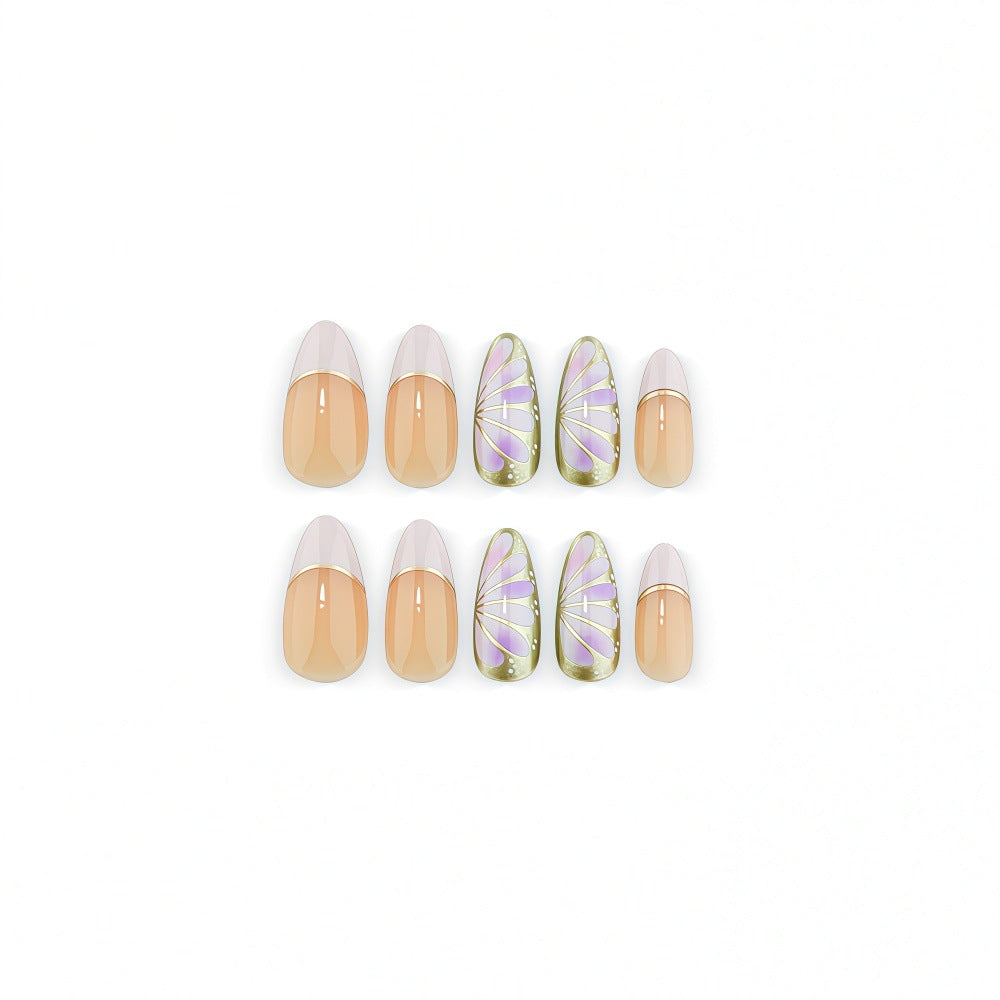 Artificial nails with luxurious gold edge and filigree design Bowlift