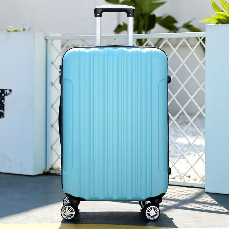 Hard shell suitcase with 360-degree wheel system and integrated safety feature Bowlift