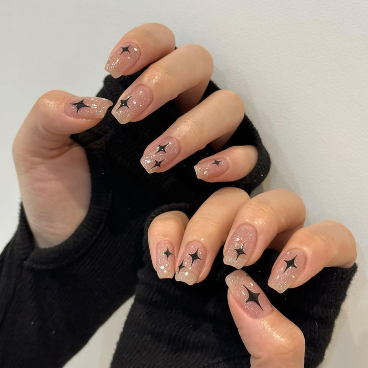 Artful Nail Extensions with Glitter and Star Pattern Bowlift