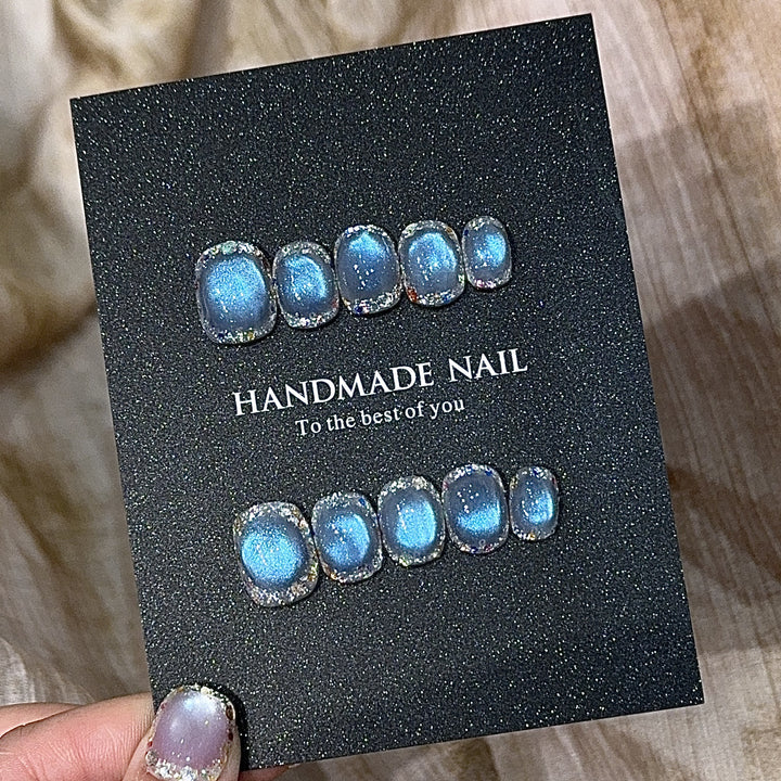 Handmade art nails with shimmering effects Bowlift
