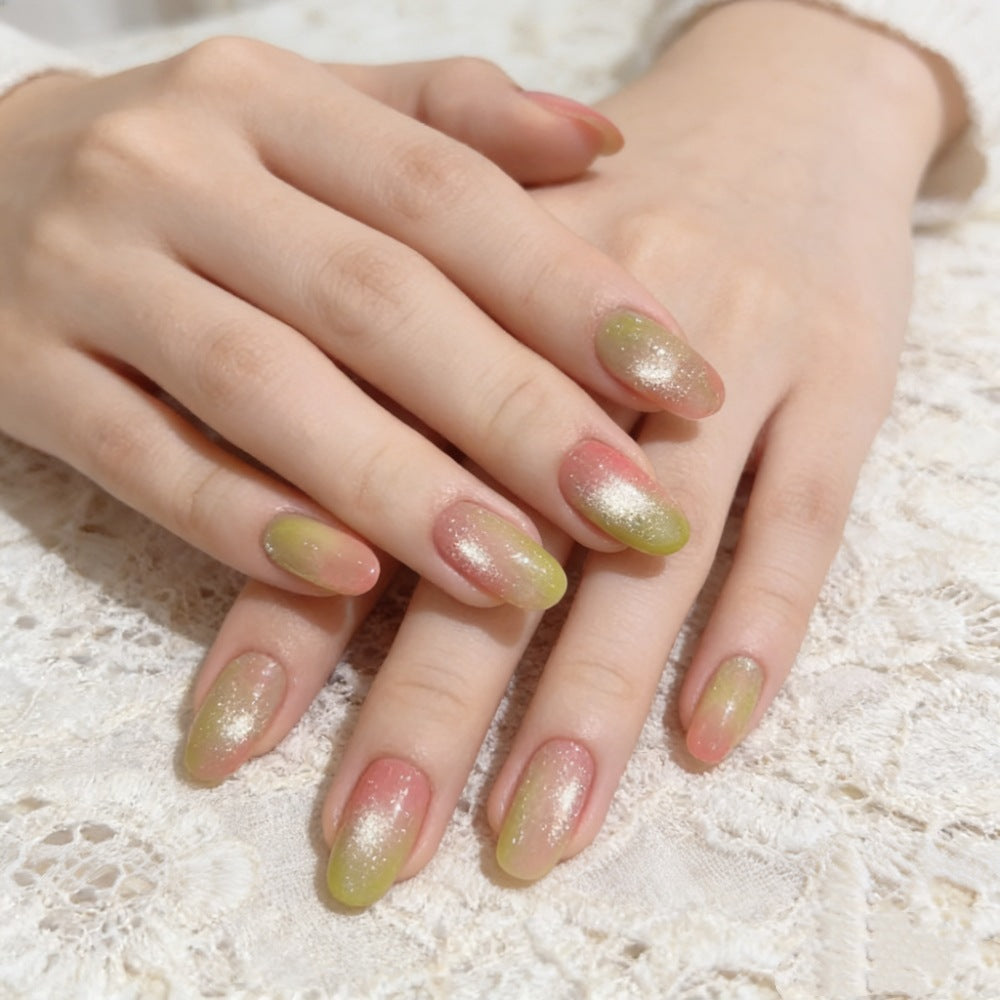 Artificial nails with elegant ombre effect and glitter accents Bowlift