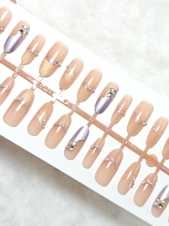 Luxury artificial nails with elegant accents Bowlift