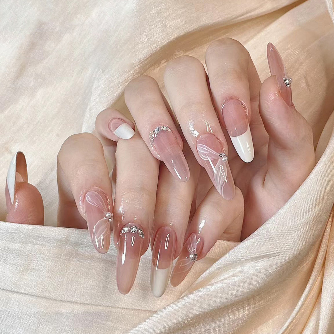 Elegant Long Stiletto Press-On Nails with Floral and Gem Accents Bowlift